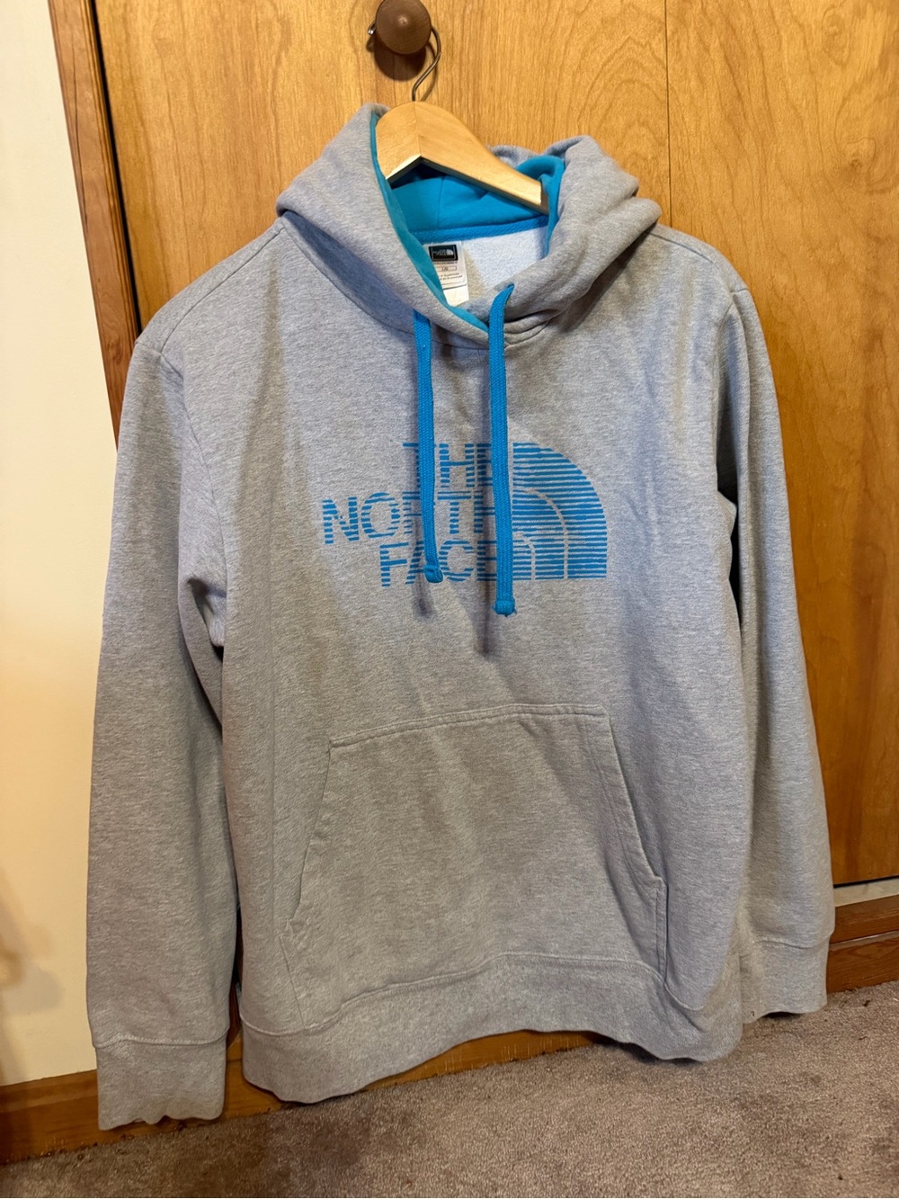 The North Face Women’s Gray Crewneck Hoodie with Blue Logo